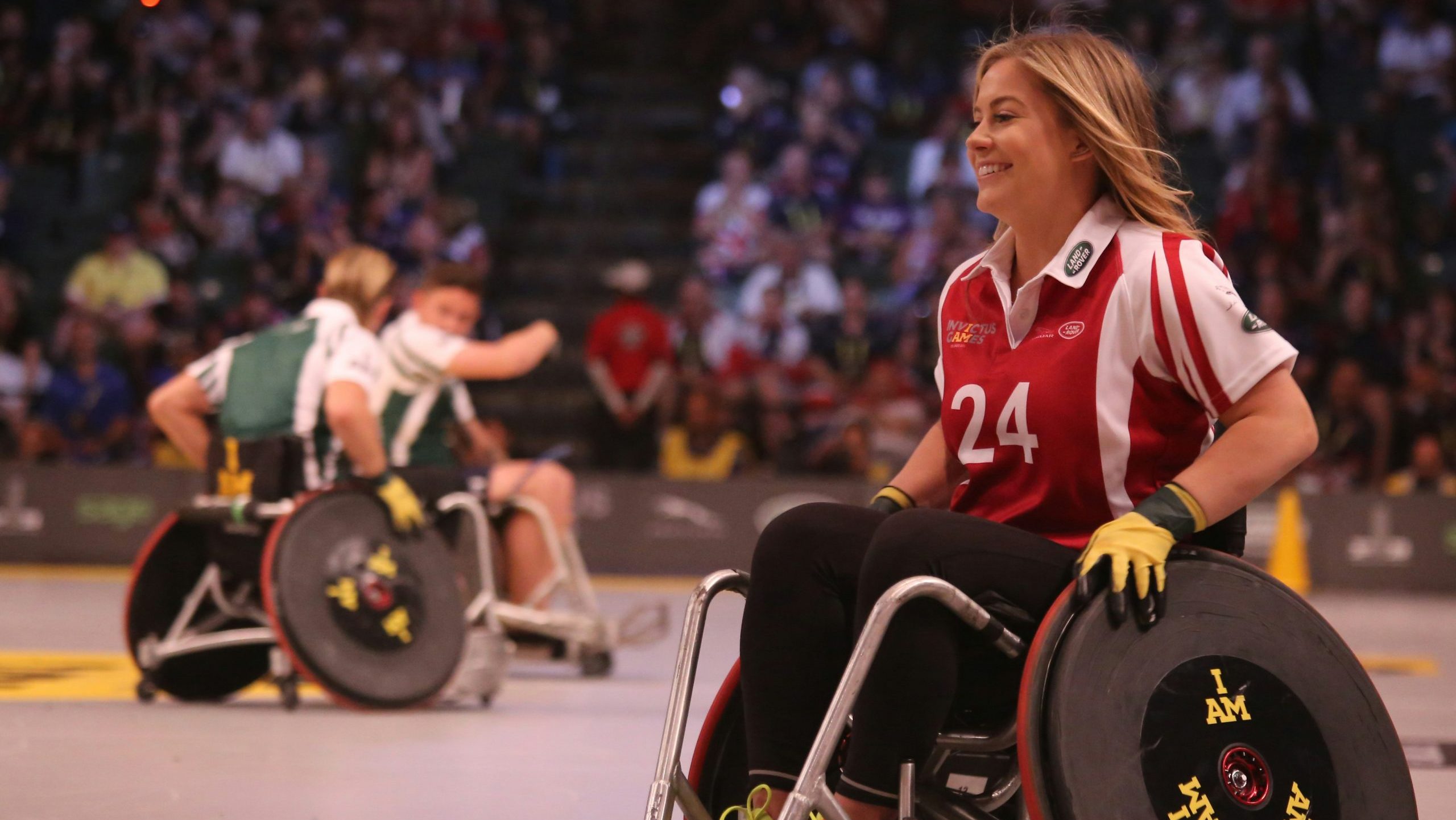 A young woman is playing a wheelchair sport